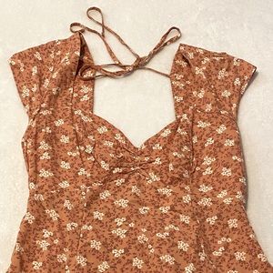 Aeropostale orange floral dress with back ties. Size small.